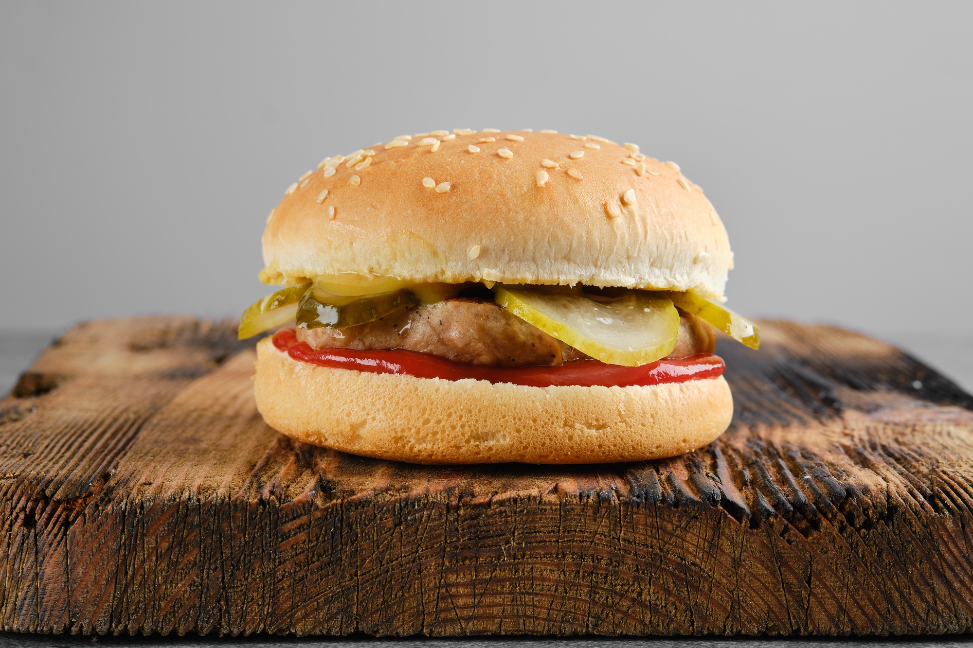 Classic hamburger on wooden background